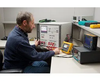 engineer calibrating equipment